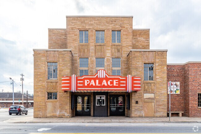 Traveling musicians play at the Palace Theater built in 1938.