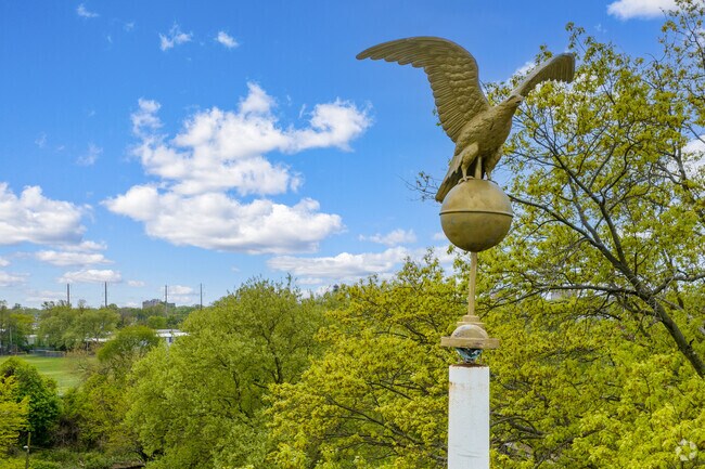 An eagle statue sits atop a WWII memorial in the East Trenton neighborhood.