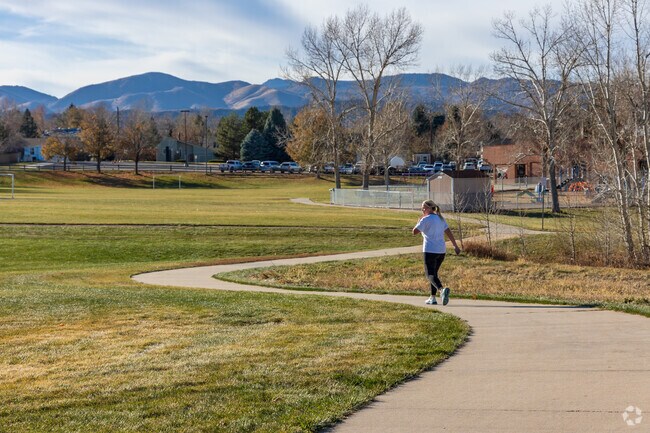 A paved walking trail connected to Coronado Park traverses the width of the neighborhood.