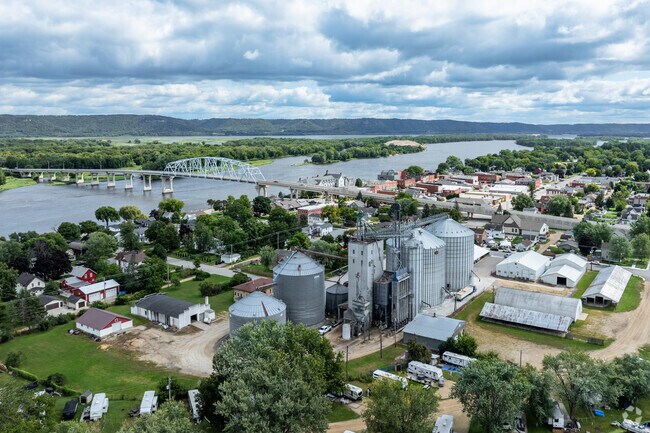 Wabasha residents sit opposite the Minnesota-Wisconsin state line along the Mississippi River.