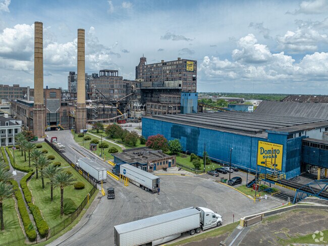 The Domino Sugar Refinery offers employment to the residents of Arabi, and sponsors Sugar Fest.