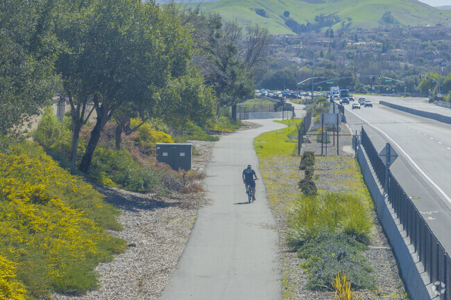 A beautiful bike trail follows route 84 in Three Fountains.