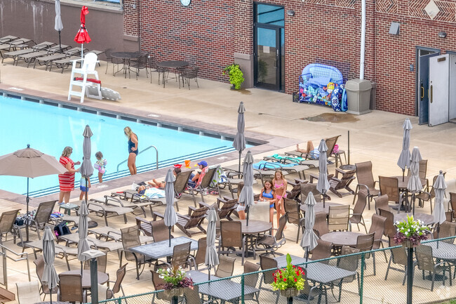 The pool at Shorewood Country Club offers a diving board and more near Forest Hills View.