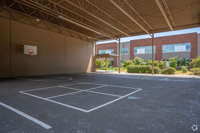 Covered basketball and foursquare courts at Rosedale Elementary School in Hillsboro, Oregon.
