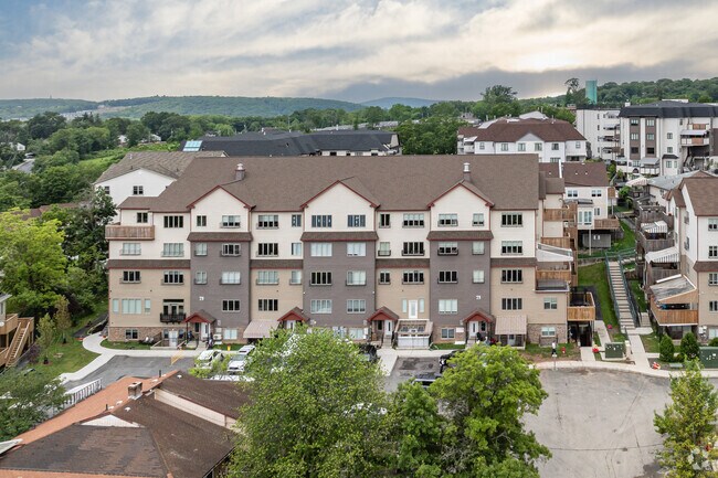 In many cases, housing in Kiryas Joel is developed or managed by community-controlled organizations or religious institutions.