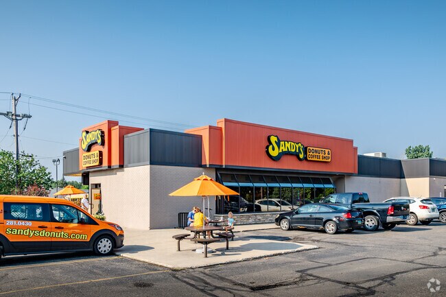 Stop into Sandy's Donuts to get your morning coffees near Berger.