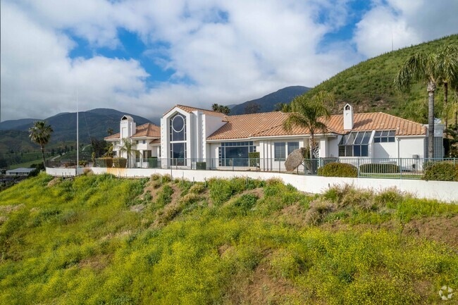 Large Mediterranean style homes on hillsides can be found in Northeast Sterling.