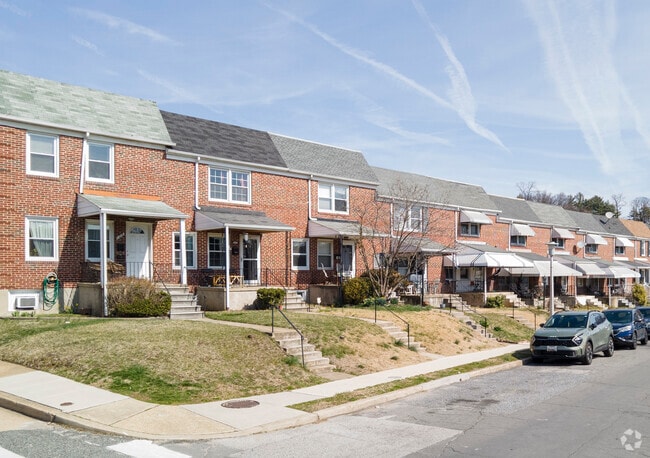 Small shaded front porches allow Medfield residents to escape the heat in the summer.