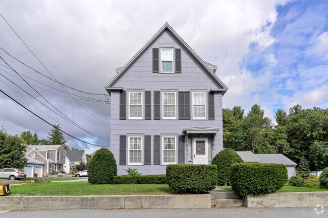 This grey-purple-ish house is a common style in Chelmsford.