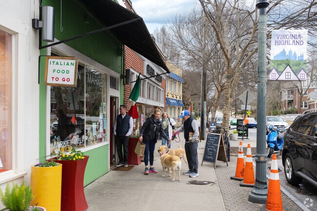Virginia Highlands wide, paved sidewalks welcome dog walkers and their canine companions.