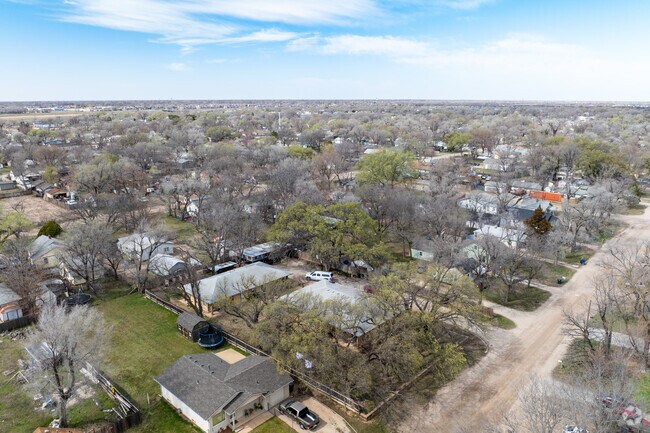 Most homes in Orchard Breeze are surrounded by trees.