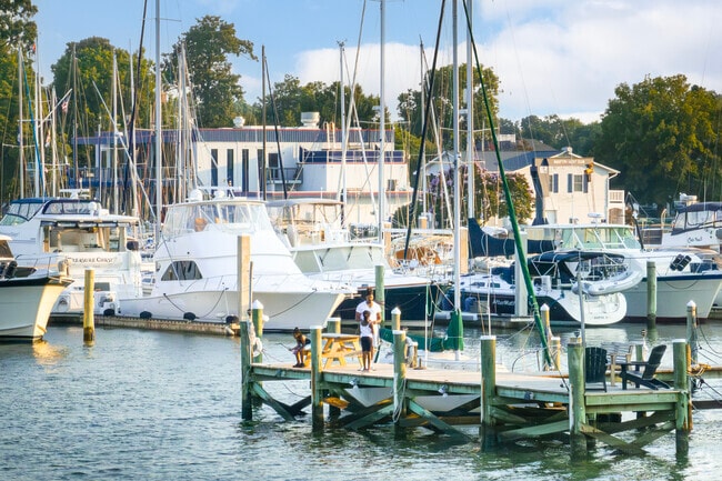 Newtown/Crown Point families fish off the pier at the Blue Water Yacht Center.