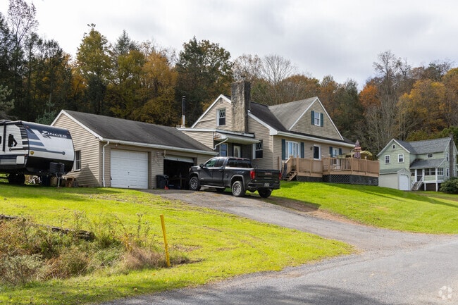 Many homes add decks to take in the Allegheny Mountain views.