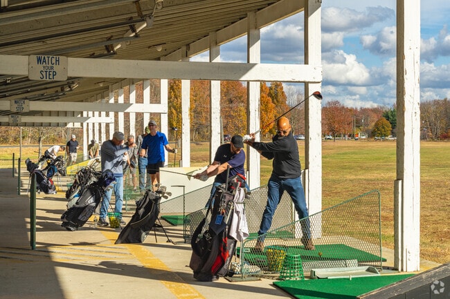 Book a tee time or hit balls at the driving range at Indian Spring Country Club near Greentree.