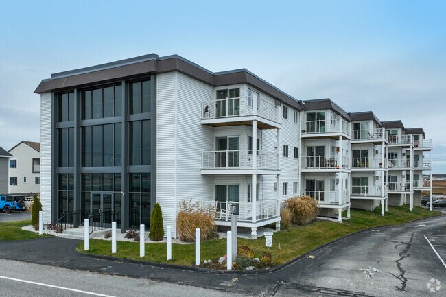 Hampton Beach condos feature ocean-view balconies and coastal charm.