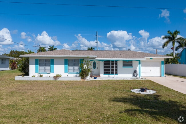 Mid-century waterfront homes can still be found along canals in the Hancock neighborhood.
