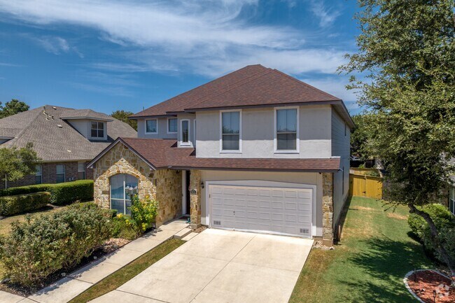 Many homes in Smithson Valley have stone facades.