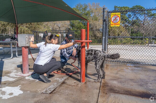 Enterprise Dog Park welcomes families to wash their pup after a fun day at the park.