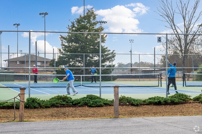 Play a tennis match with friends at the Pell City Civic Center near Cropwell.