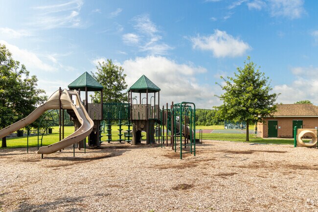 Van Horne Park includes a playground, ball fields, and basketball courts.