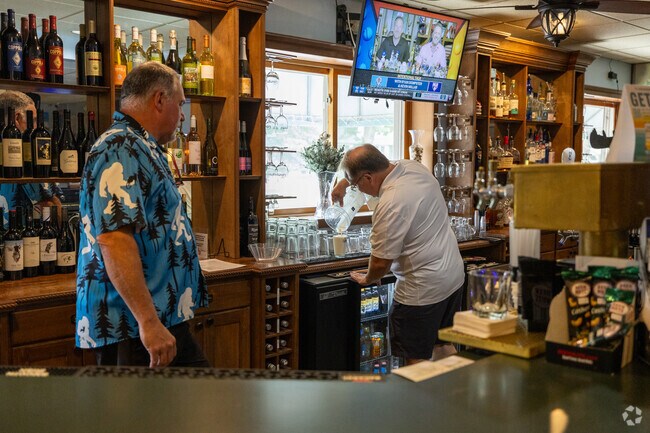 Staff preparing a drink at the Delavan Lake Store, a local favorite.