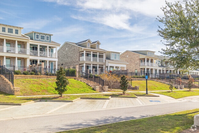 Waterfront townhomes offer scenic views and space for couples or families.
