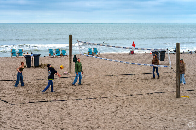Residents and tourists enjoy playing beach volleyball in Cape Canaveral.
