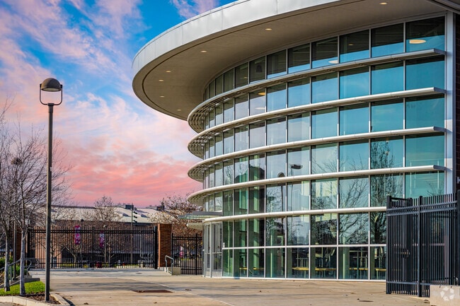 Colorful sky stretches over the unique architecture at Antelope High School.