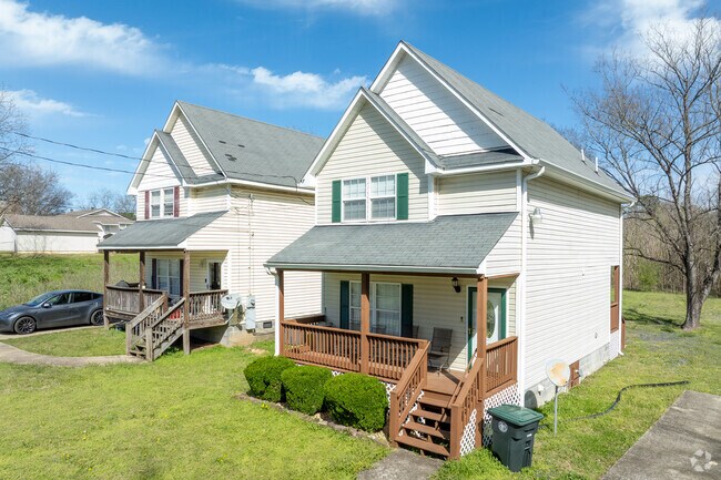 Feel invited by the welcoming from porches on this craftsman style house.