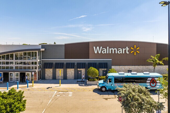Lawn Acres, FL residents shop for essentials at Walmart near the neighborhood center.
