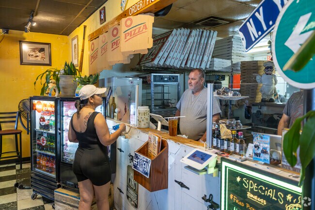 Bambino’s New York Style Pizzeria's cozy atmosphere and friendly staff provide a welcoming dining experience for families from McDade.