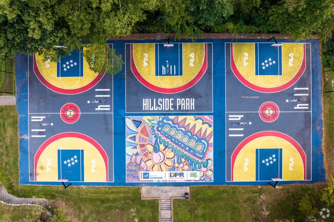 A muralled basketball courts at Hillside Park greets people in the Spaulding Community.