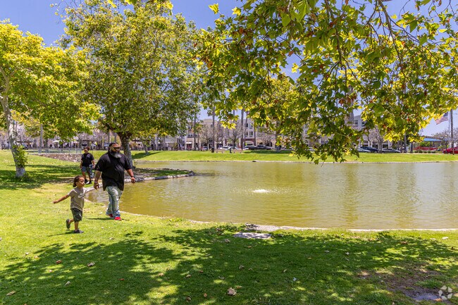 Community gathers in the outdoors in Heritage Park in Otay Village Ranch.