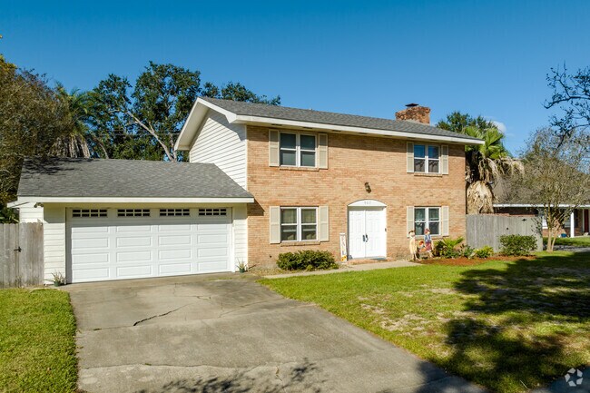 Colonial-style homes with attached garages are popular in Neyland Park.