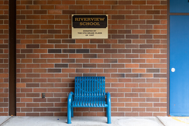 A 6th-grade class at Riverview Elementary School donated a blue bench by the entrance.