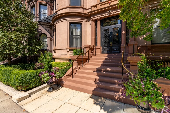 Decorative planters graciously greet you outside of 19th-century brownstones in Back Bay.