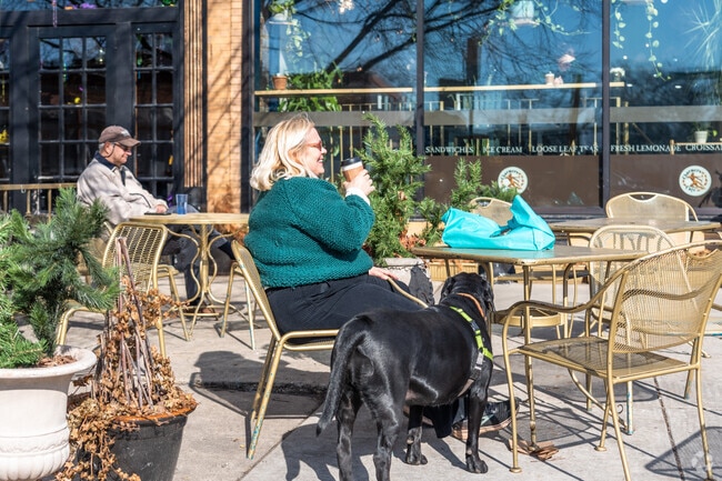 On warm sunny days you will find patrons outside of Charmers Cafe in Rogers Park.