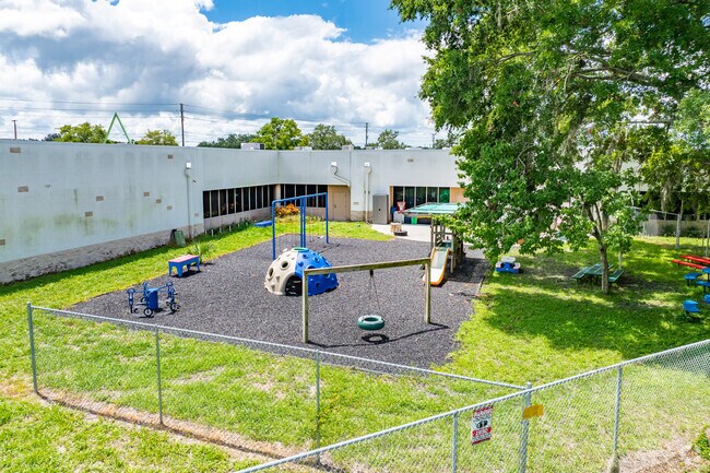 Kids enjoy playing on the play area at Bishop Larkin Catholic School.