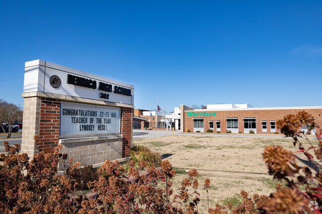 Sign and front of Henrico High School in East Highland Park.
