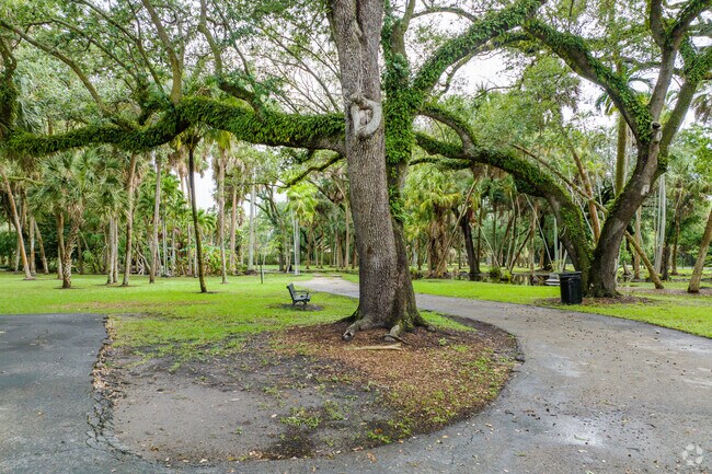 Bench along a walking path in Riverland Preserve in the River Run neighborhood.