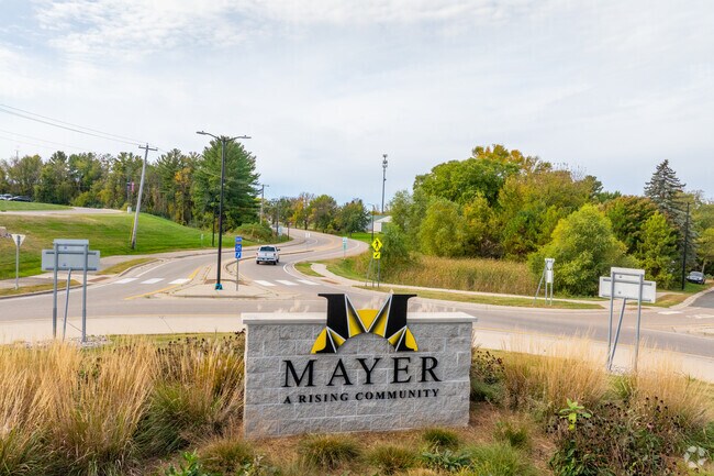 The town’s entrance sign proudly declares Mayer as “A Rising Community,” inviting visitors into its growing environment.