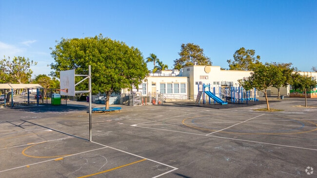 Kids can play in the recreation area just outside Lowell Elementary School.