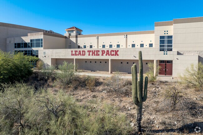 Scottsdale’s Desert Mountain High School, where the slogan is “Lead The Pack”.