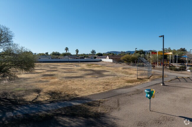 Grijalva Elementary School has a large field for children to play in.