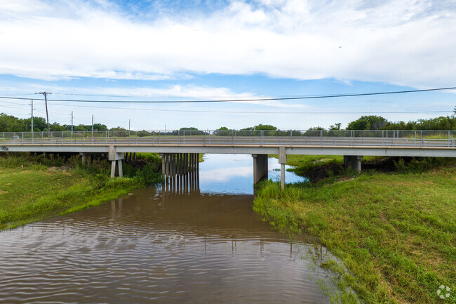 There is a small bridge providing access over the Arkansas River in Northend Riverview.