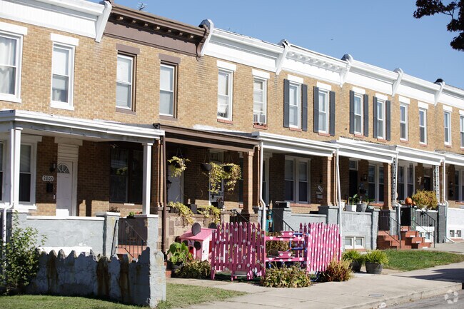 These brick rowhomes are packed tightly together, and Herring Run residents add their own vibes.
