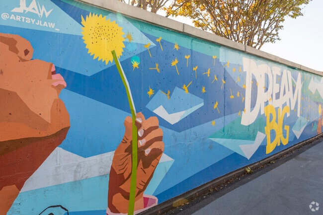 A colorful mural brings cheer to the Liberty Square neighborhood.