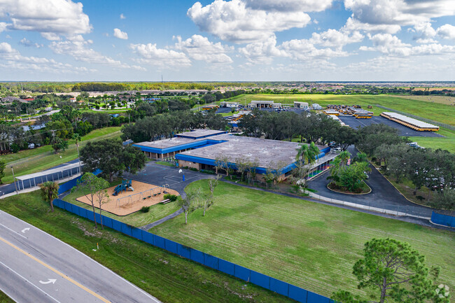 Buckingham Exceptional Student Center has a central main entrance and covered waiting areas.