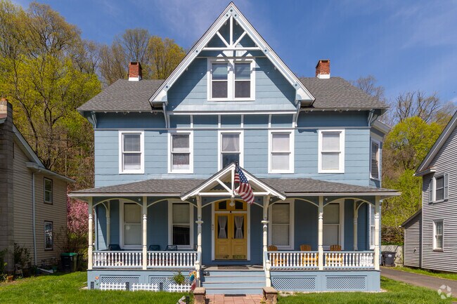 Colorful trim and ornate porches define Milford’s restored Folk Victorian homes.