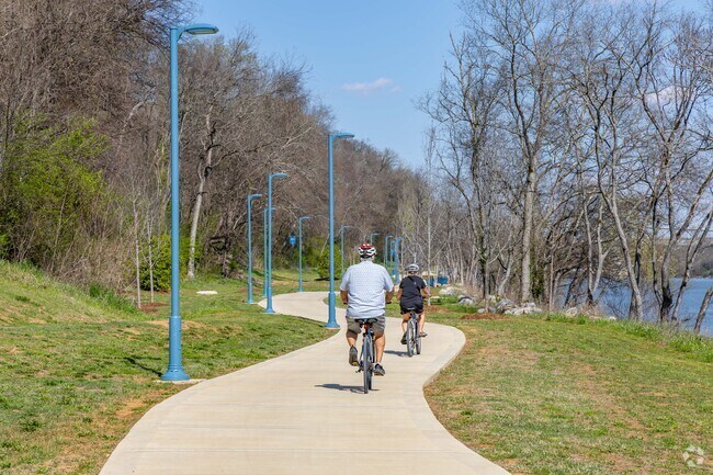 Couples love to bike on the River Heritage Trail on the Tennessee River.